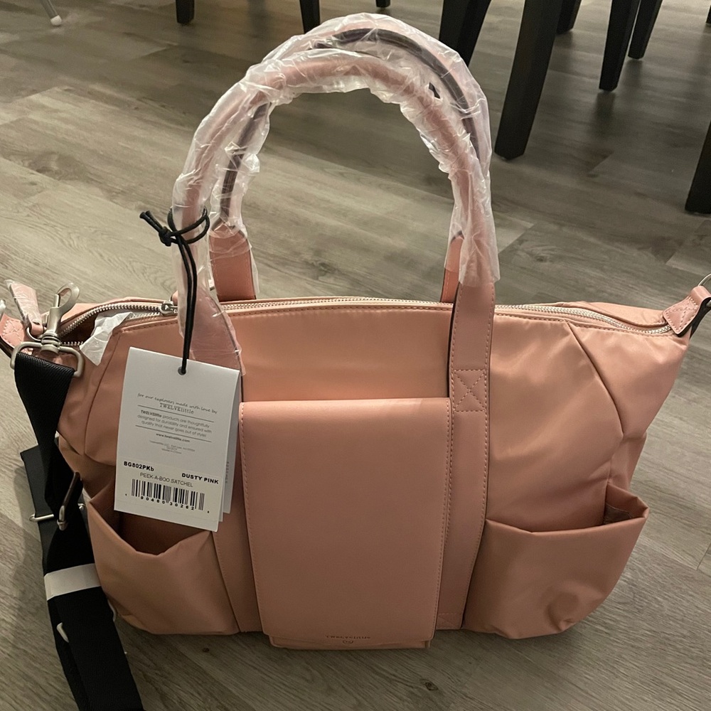 Twelvelittle peek-a-boo satchel
